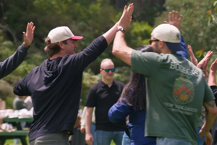 High fives at a team offsite